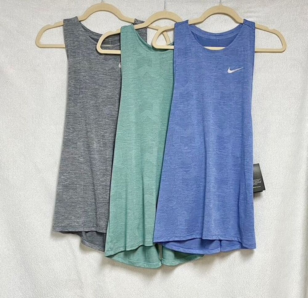 Lot of 3 brand new with tags Nike Dry medalist running tanks. All size large